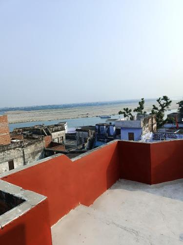a view of the beach from the roof of a building at Sukoon River Homestay in Varanasi
