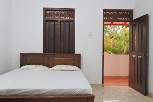 Giường trong phòng chung tại SP Taru Surf Camp&Restaurant