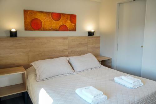 Postel nebo postele na pokoji v ubytování Hotel 7 Lagos