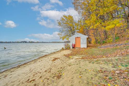 a small shack on the shore of a lake at Home on Legacy Hills Golf Course with Patio! in LaPorte