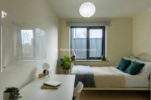 Ένα ή περισσότερα κρεβάτια σε δωμάτιο στο Mary Morris House Cozy Budget Stay with Shared Washroom