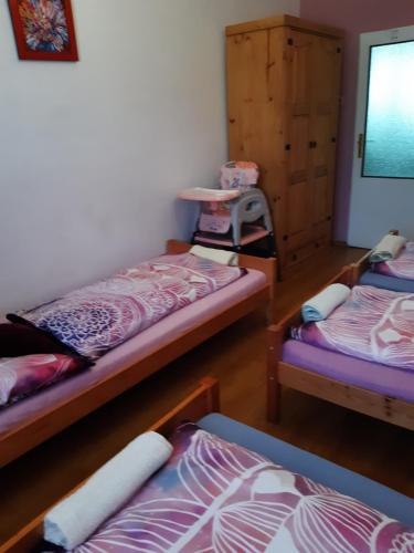 Postel nebo postele na pokoji v ubytování U paní malířky