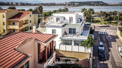 an aerial view of a city with buildings and a river at Villa Marcello in Cagliari