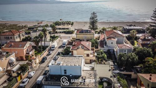an aerial view of a city with a beach at Villa Marcello in Cagliari