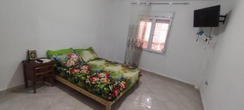 Μια τηλεόραση ή/και κέντρο ψυχαγωγίας στο Appartement Ténès