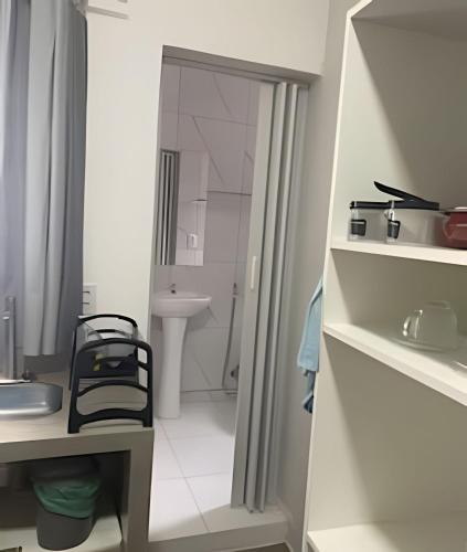 a small bathroom with a sink and a toilet at Residencial JC II sua casa em Belém do Pará in Belém