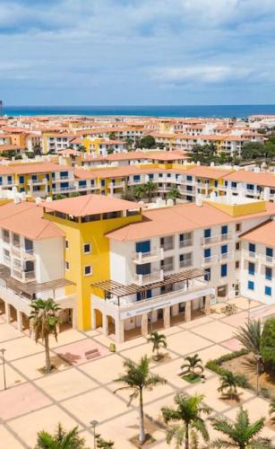 an aerial view of a city with palm trees and buildings at Sol & Lar No stress in Santa Maria
