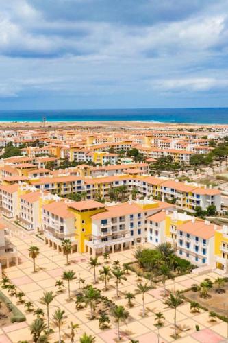 an aerial view of a city with palm trees and buildings at Sol & Lar No stress in Santa Maria
