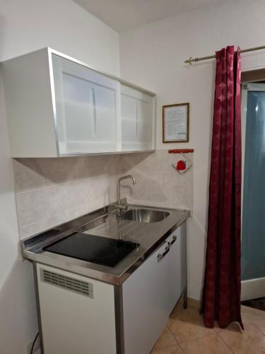 Kuchyň nebo kuchyňský kout v ubytování Bed&Breakfast L'Oasi