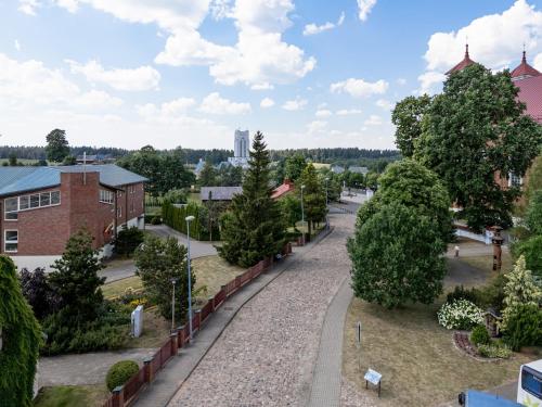 an aerial view of a park with trees and buildings at Jono Pauliaus II piligrimu namai in Raseiniai