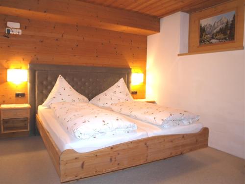 Postel nebo postele na pokoji v ubytování Appartement im Dorf