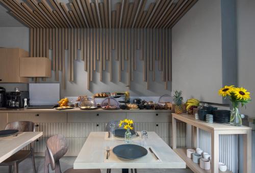 Η κουζίνα ή μικρή κουζίνα στο Evora Luxury Suites