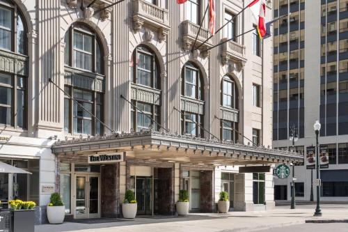a building with a sign that reads the tim hortons at The Westin Book Cadillac Detroit in Detroit