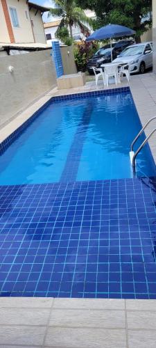 Πισίνα στο ή κοντά στο Casa 10 COND BRISAS DO FAROL n 07