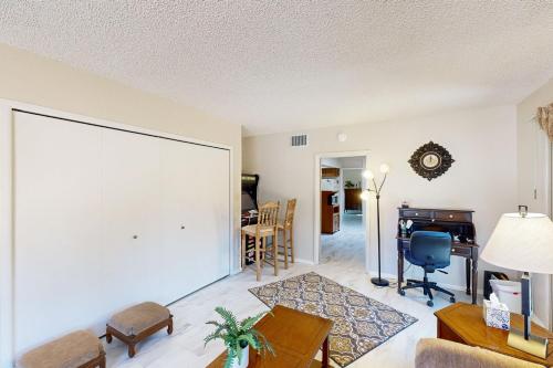 a living room with a couch and a table at Sierra Serenity Retreat in Sierra Vista