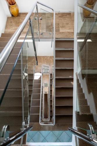 a view of a stairway with a glass railing at Hotel Ca' Bianca in Riccione