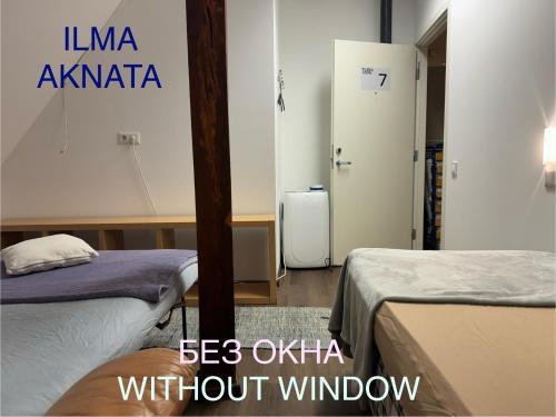 Ένα ή περισσότερα κρεβάτια σε δωμάτιο στο Rotermanni Hostel near harbor 4 floor