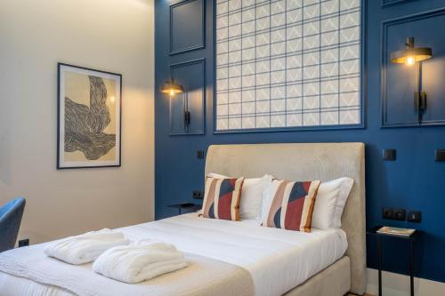 Katil atau katil-katil dalam bilik di Gigantones GuestHouse
