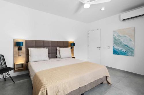 Ένα ή περισσότερα κρεβάτια σε δωμάτιο στο Bonaire Beach Apartment 1 with communal pool and diving facilities