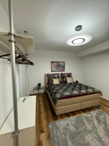 Ένα ή περισσότερα κρεβάτια σε δωμάτιο στο Zeitperlewohnen Beige