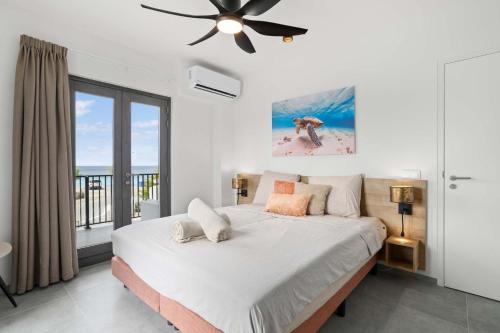 Postel nebo postele na pokoji v ubytování Bonaire Beach Apartment 6 with shared pool and diving facilities