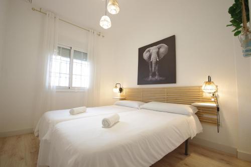 Postel nebo postele na pokoji v ubytování Livingtarifa Apartamento Agaporni