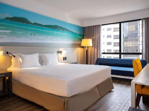 Postel nebo postele na pokoji v ubytování Novotel Florianopolis