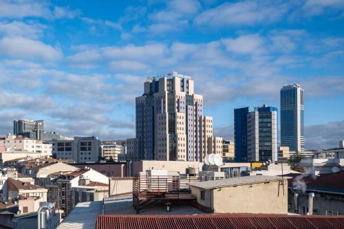 a view of a city skyline with tall buildings at Icon Hotel Bomonti in Istanbul