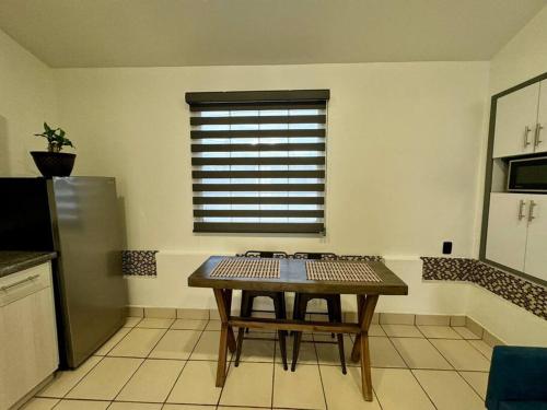 Η κουζίνα ή μικρή κουζίνα στο Comodo Departamento con Terraza