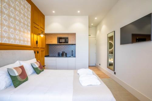 Katil atau katil-katil dalam bilik di Gigantones GuestHouse