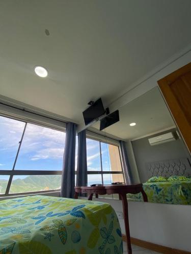 Postel nebo postele na pokoji v ubytování Rodadero Excelente Apartamento