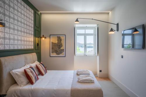 Postel nebo postele na pokoji v ubytování Gigantones GuestHouse