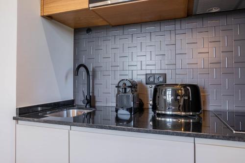 Dapur atau dapur kecil di Gigantones GuestHouse