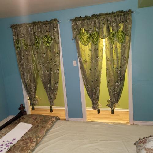 Кровать или кровати в номере Chambre vu à couper le souffle