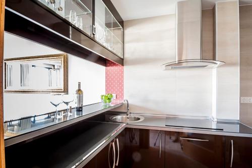 A kitchen or kitchenette at Apartamento Vistabella