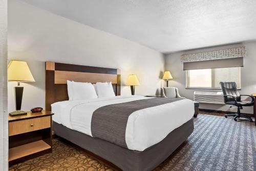Ένα ή περισσότερα κρεβάτια σε δωμάτιο στο Best Western Sawtooth Inn and Suites
