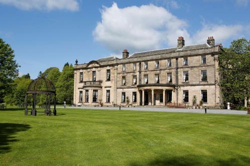a large building with a gazebo in front of it at Beamish Hall Hotel, BW Premier Collection in Stanley