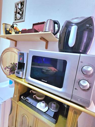 Dapur atau dapur kecil di AMA Esclusive SPA Madama