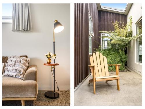 a living room with a chair and a lamp at The Solitude - Comfort at its Best by Carmichael Reserve in Tauranga in Tauranga