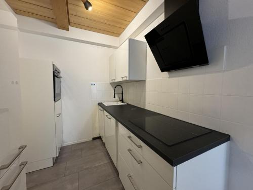 Η κουζίνα ή μικρή κουζίνα στο Ferienhaus Möhrle 3