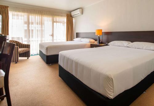 Кровать или кровати в номере Sudima Hotel Christchurch Airport