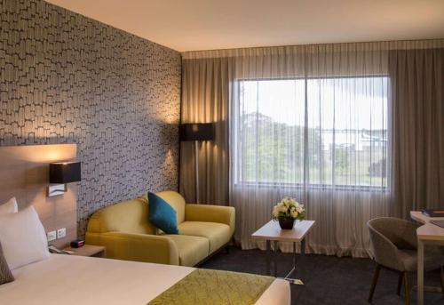 Кровать или кровати в номере Sudima Hotel Christchurch Airport