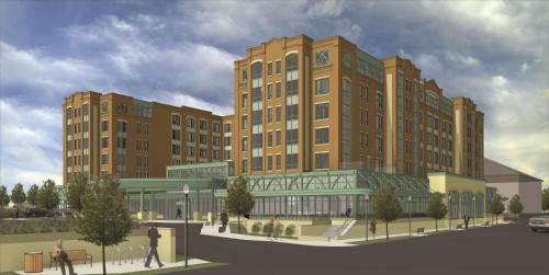 a rendering of a building with people walking in front of it at Embassy Suites Saratoga Springs in Saratoga Springs