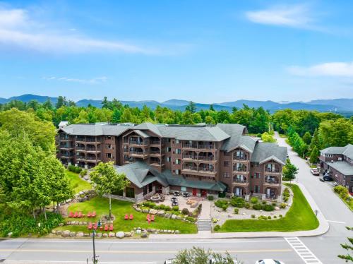 an aerial view of a apartment complex with a street at Hampton Inn & Suites Lake Placid in Lake Placid