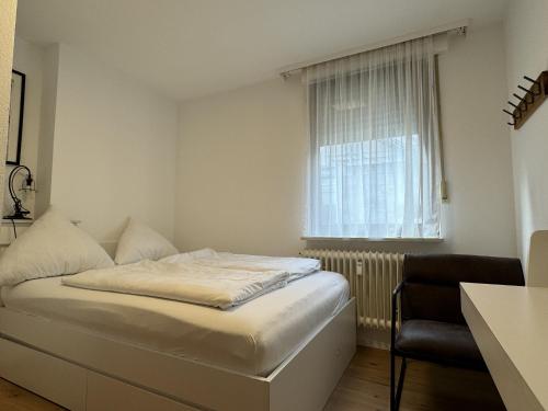 Ένα ή περισσότερα κρεβάτια σε δωμάτιο στο Ferienhaus Möhrle 4