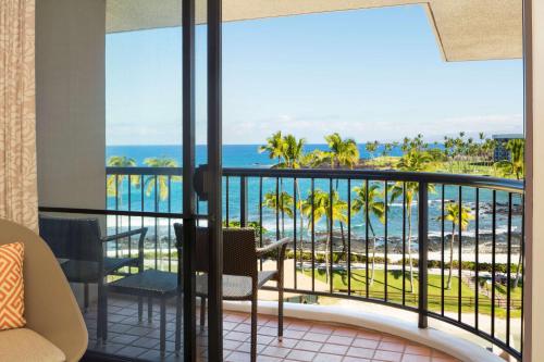 a room with a view of the ocean at Hilton Waikoloa Village in Waikoloa