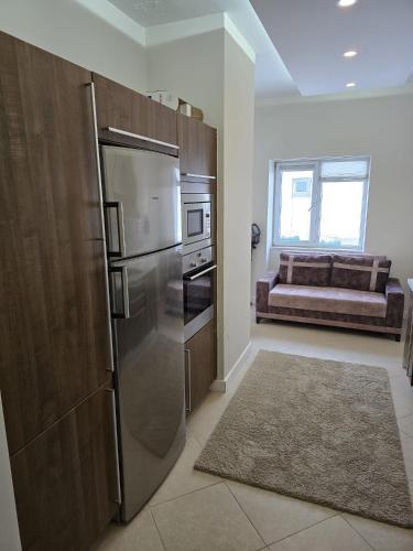 Η κουζίνα ή μικρή κουζίνα στο Bahcesehir Rent House