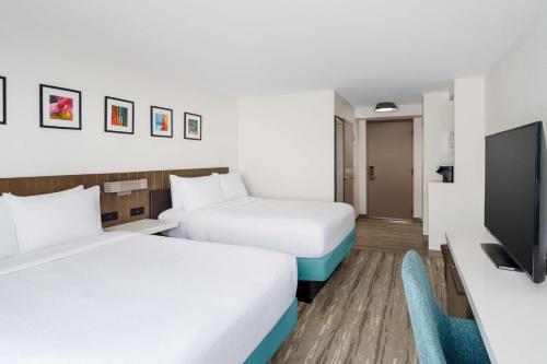 Letto o letti in una camera di Hilton Garden Inn Lake Mary