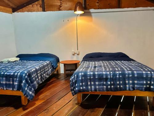 Postel nebo postele na pokoji v ubytování Villa los Alfredos