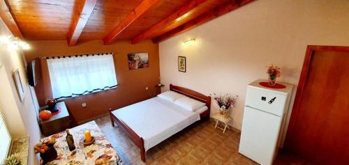 Posteľ alebo postele v izbe v ubytovaní Apartment Julija